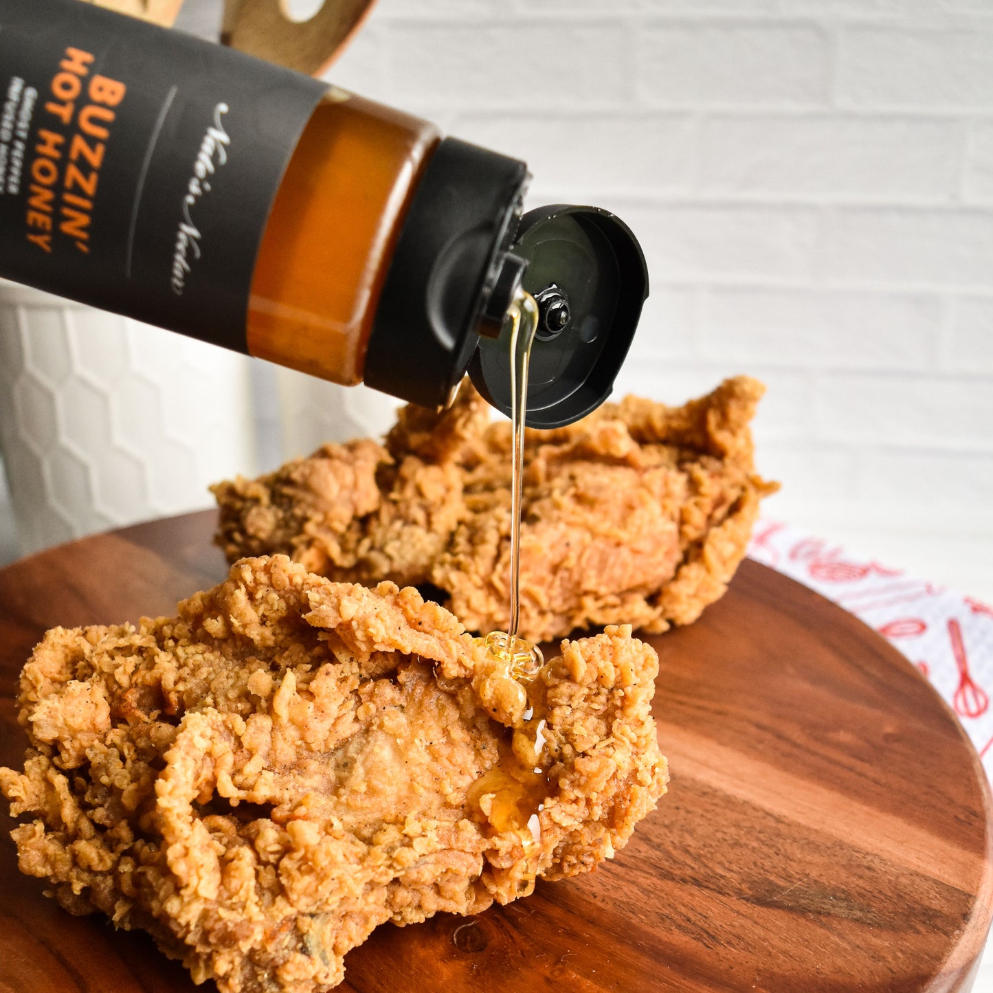 Nate's Nectar Buzzin' Hot Honey, Hot Honey, squeeze bottle, hot honey drizzled on fried chicken