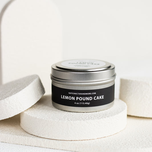 Candle jar labeled 'Lemon Pound Cake' on a white background