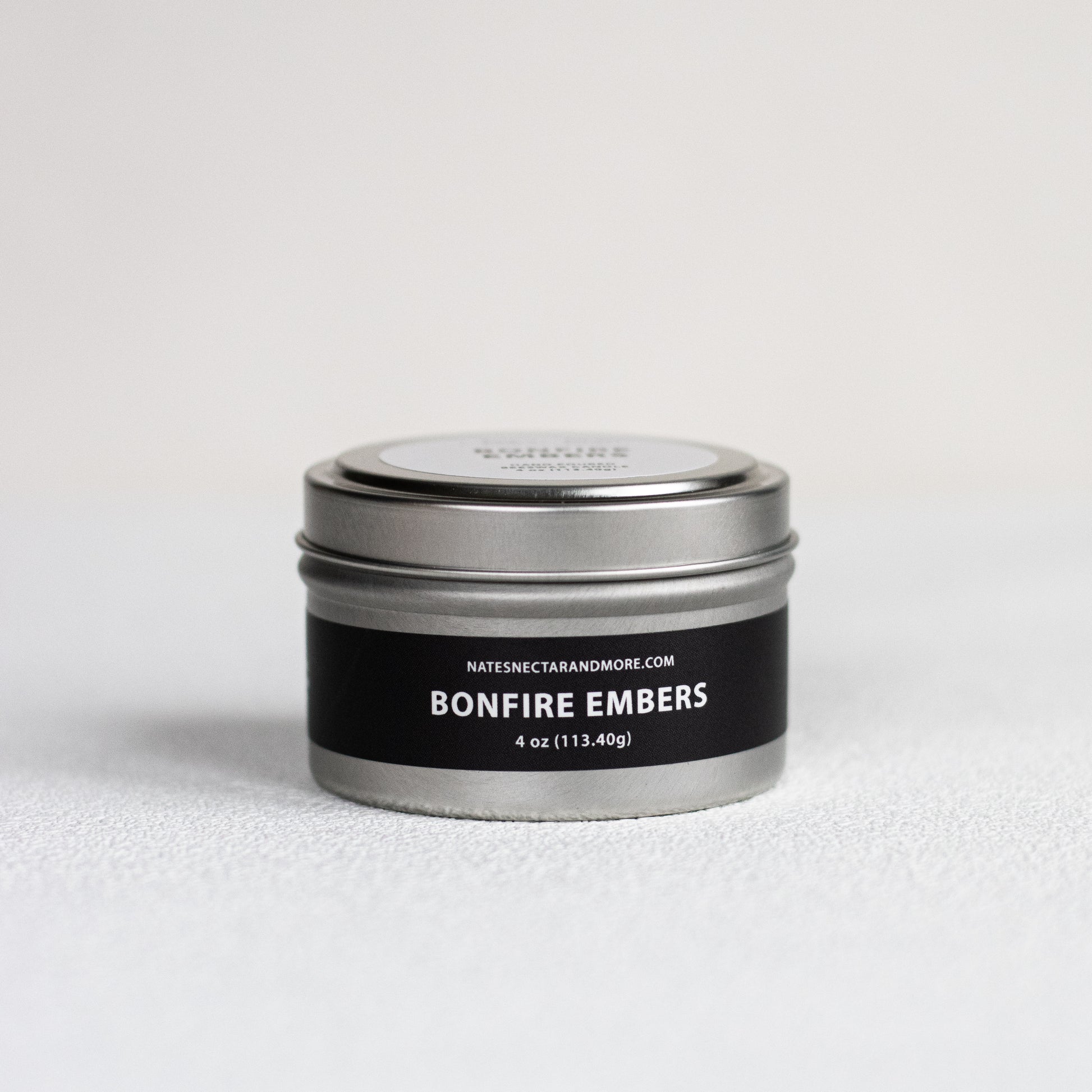 Tin labeled 'Bonfire Embers' on a light gray background