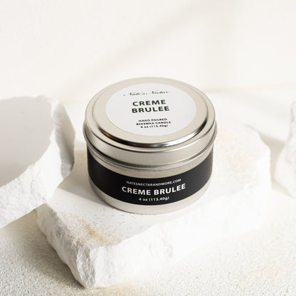 Jar of 'Creme Brèleé' on a textured white surface