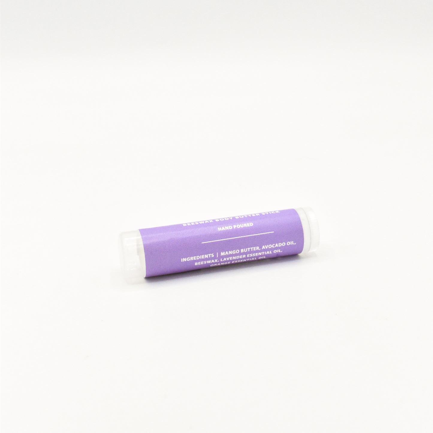 Solid lavender orange body butter in a push-up stick for on-the-go use