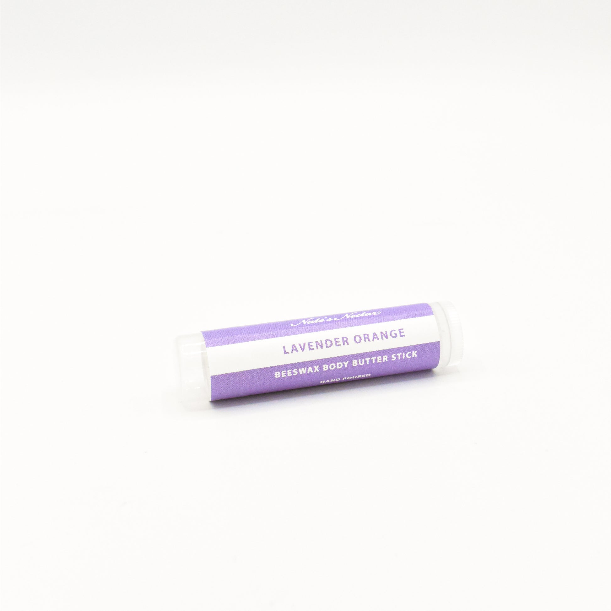 Solid lavender orange body butter in a push-up stick for on-the-go use