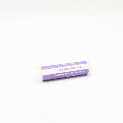 Solid lavender orange body butter in a push-up stick for on-the-go use