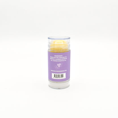 Solid lavender orange body butter in a push-up stick for on-the-go use