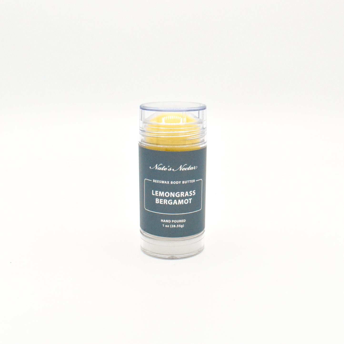 Body butter stick with 'Lemongrass Bergamot' scent on a white background