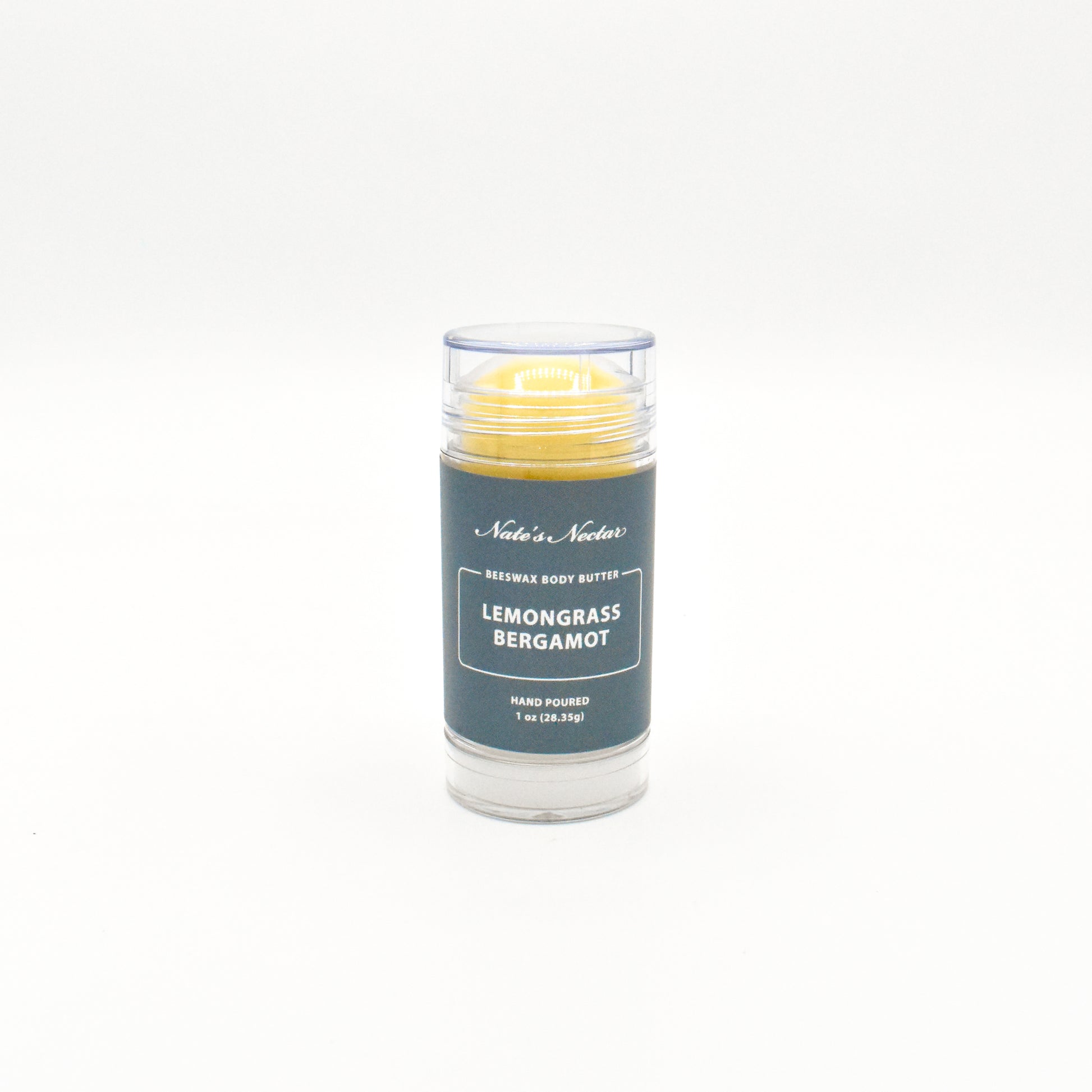 Body butter stick with 'Lemongrass Bergamot' scent on a white background