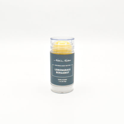 Body butter stick with 'Lemongrass Bergamot' scent on a white background